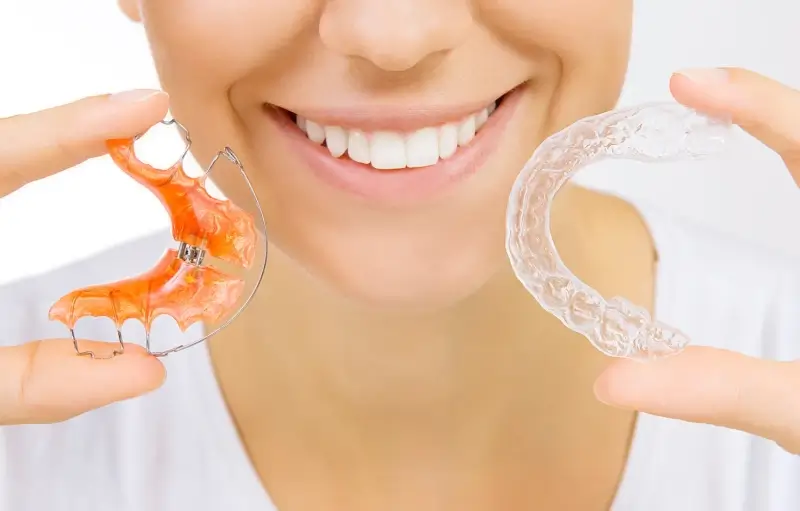Zakończenie leczenia nakładkami Invisalign